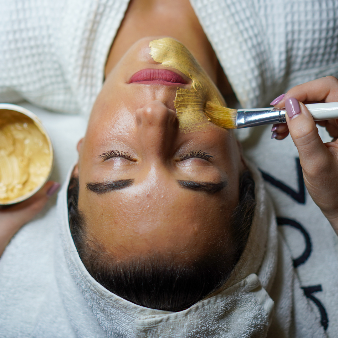 plant based masks containing turmeric, papaya enzymes, and honey can brighten your skin and reduce dark spots.