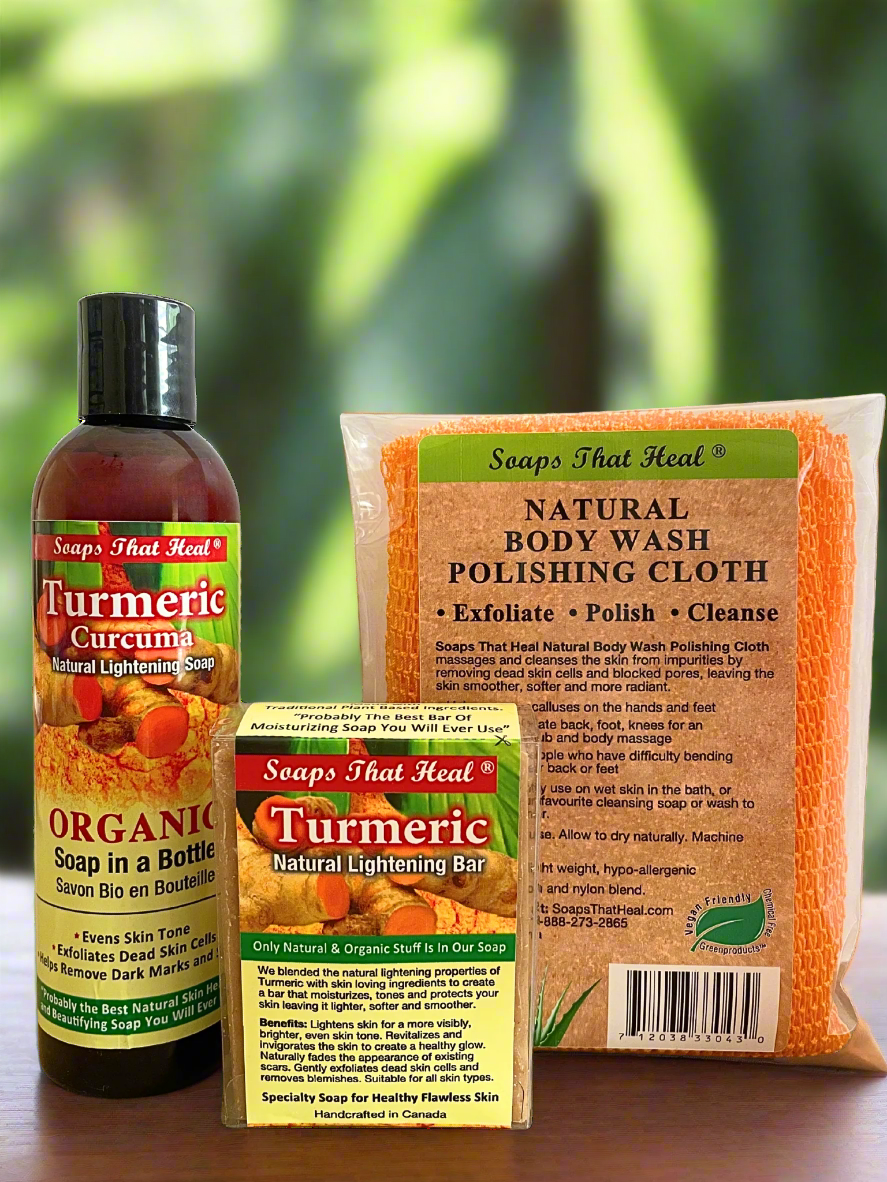Collection of 'Soaps That Heal' products including a bottle, bar, and cloth on a wooden surface with a blurred green background.