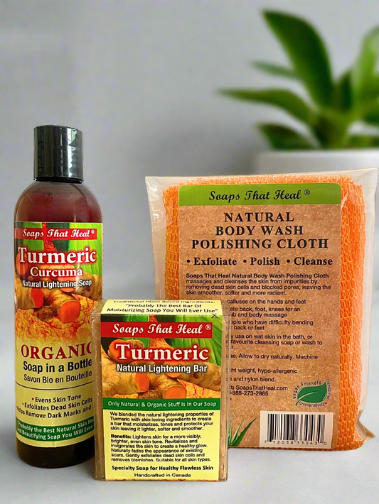 Collection of natural skincare products including a bottle, bar, and cloth with visible branding on a neutral background.
